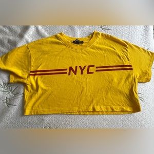 Yellow and red crop top. Perfect for going out during summer time.